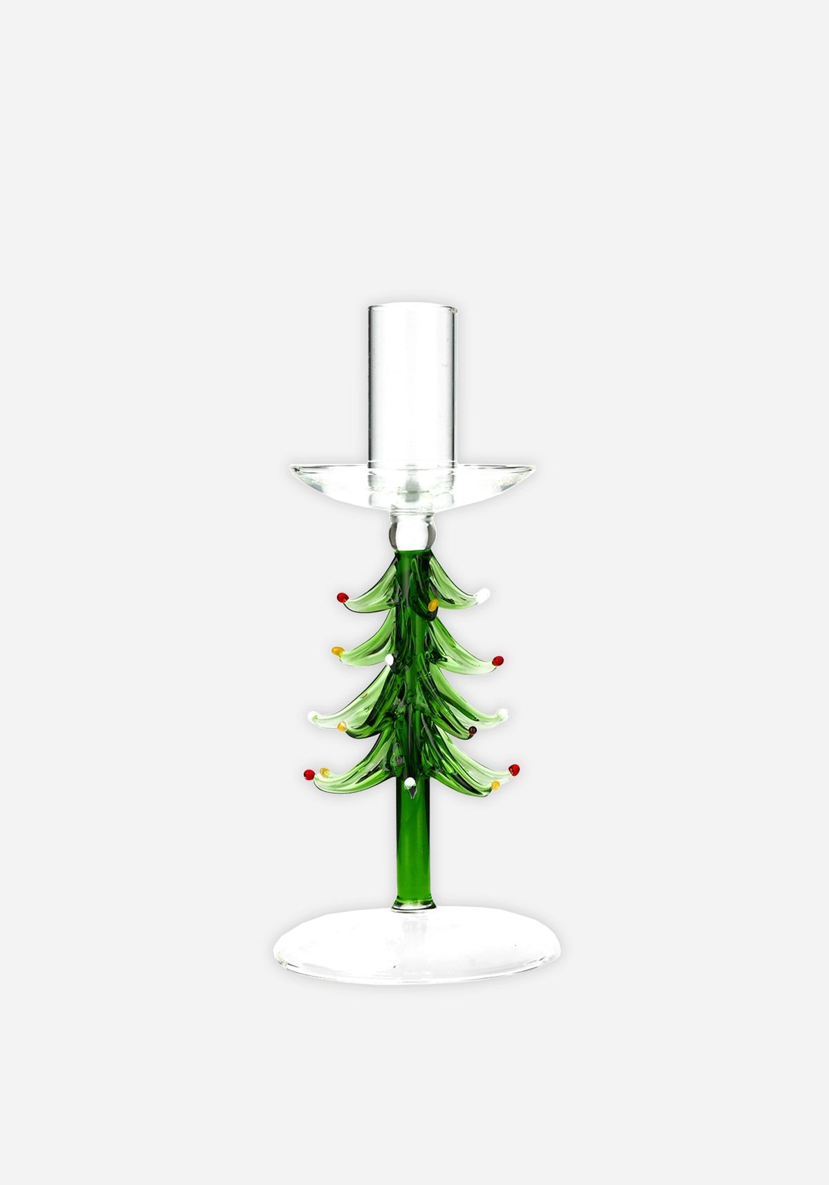 Ljusstake i glas formad som en julgran, med gröna grenar prydda med små röda, gula och vita prickar, på en fot i klart glas.