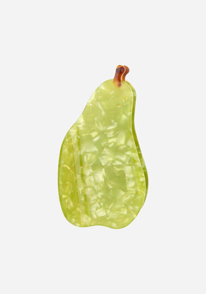 Hårklämma formad som ett grönt päron i pärlemorskimrande cellulosaacetat med guldprickar och brun stjälk, från Coucou Suzette