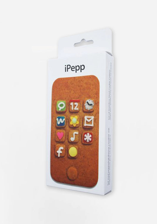 Förpackning till iPepp med bild av en pepparkaka dekorerad som en mobiltelefon, med appar i kristyr och godis.